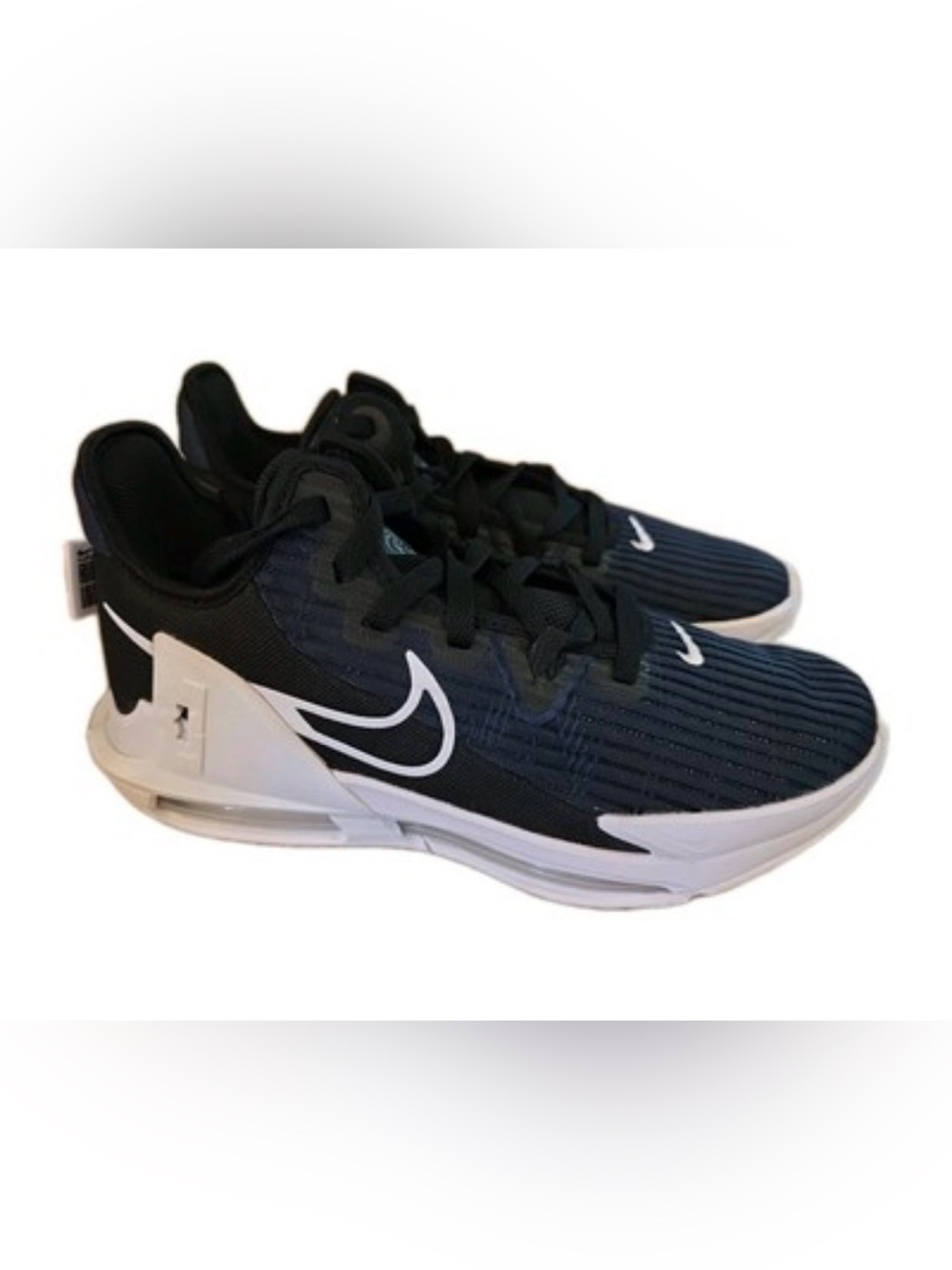 Nike LeBron Witness 6 basketball shoes in a black and dark obsidian